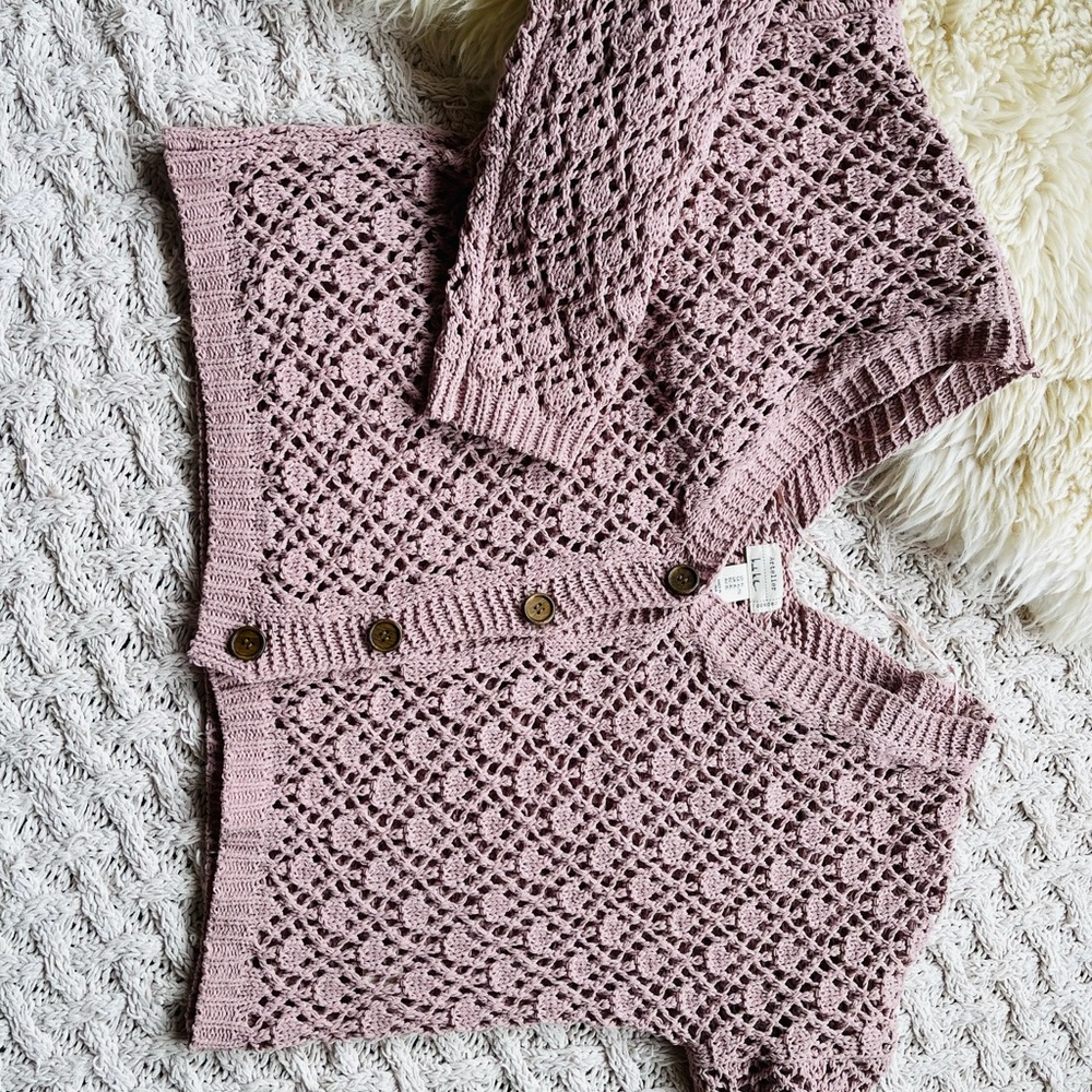 Boho style cropped cardigan by Nicole Miller.